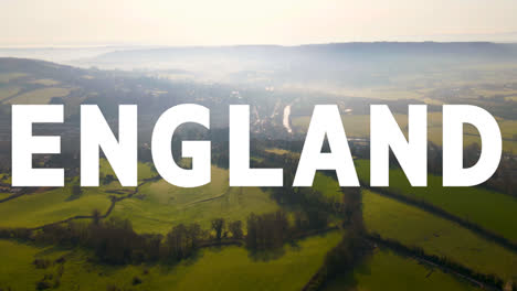 Aerial-Drone-Shot-Of-Fields-And-Countryside-In-UK-With-Animated-Graphic-Spelling-Out-England